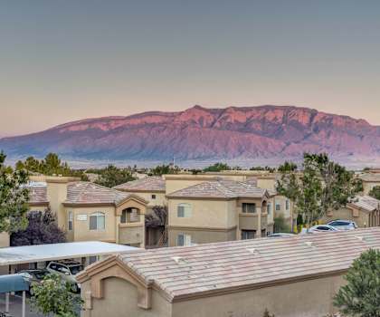 an aerial view of a neighborhood with mountains in the background at Links at High Resort, Rio Rancho