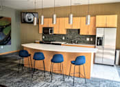Thumbnail 10 of 26 - The community room comes equipped with a full sized kitchen -  Great for hosting!