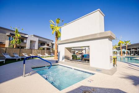resort-style pool with spacious sundeck and available Wi-Fi