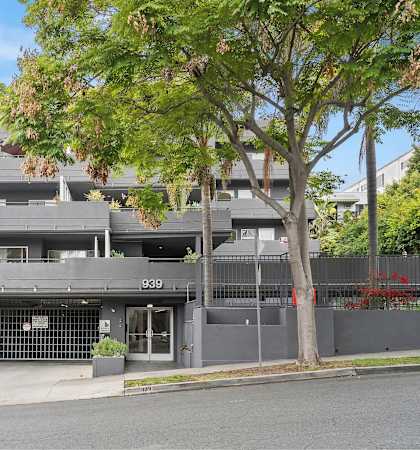 A grey building with the number 939 on it.