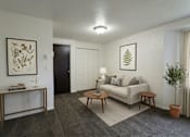Thumbnail 2 of 8 - A living room with a white couch, a wooden coffee table, and a potted plant.