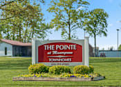 Thumbnail 16 of 16 - A sign for The Pointe at Meadowcreek is displayed in front of a building.