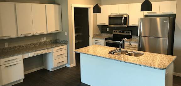 Fully Equipped Kitchen With Modern Appliances at Mezzo Apartments, North Dakota, 58104