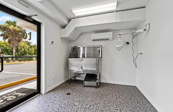 A kitchen area with a sink and a window. at The Teale Siesta Lago in Kissimmee, FL, 34746