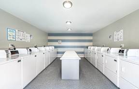 the laundry room is equipped with washers and dryers at Colima Terrace Apts, Rowland Heights, CA