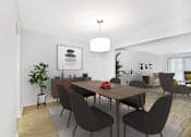 Thumbnail 2 of 5 - A dining room with a wooden table and chairs.
