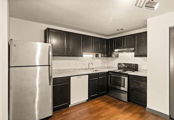 Kitchen with Stainless Steel Refrigerator at Harbor Oaks, Steilacoom, WA, 98388