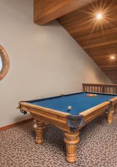 a pool table in a cabin with a porthole at Lodge of Overland Park Apartments, Overland Park , 66212