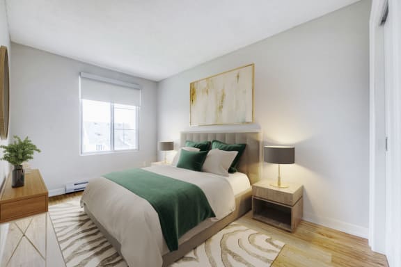 a bedroom with a bed and a window