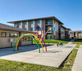 Playground For Children at Cedarbrooke Place , Norwalk, IA, 50211