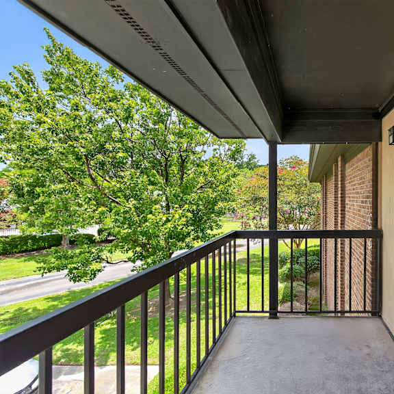 A living room with a dining table and chairs. at North Bluff Apartments, South Carolina