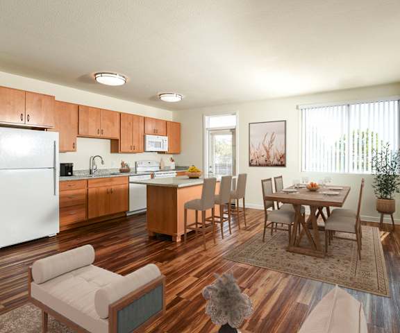 A kitchen with a dining table and chairs. at The Addie at Metro Center 55+ Apartments, Aurora, CO