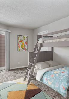 a bedroom with a bunk bed and a sliding glass door at Eastwood Crossings in Kansas City, Missouri