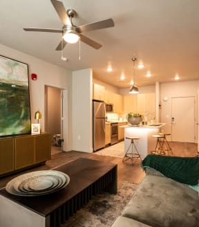 Open Living Space with Ceiling Fan  at Soleil Lofts Apartments, Herriman, UT, 84096