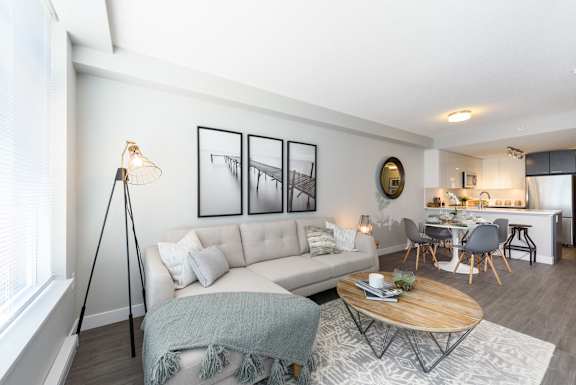 a living room with a couch and a table