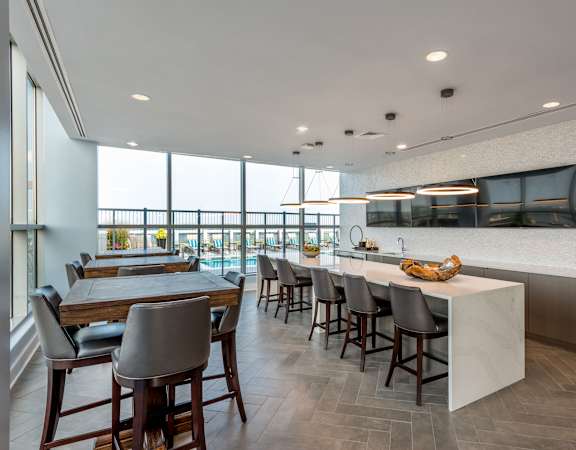 a kitchen and dining room with a table and chairs at 220 Twentieth Street, Virginia, 22202