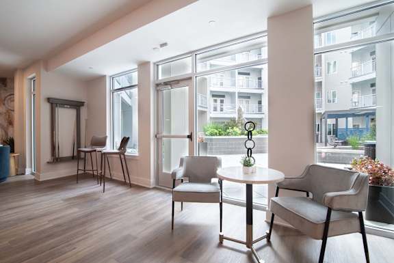 Modern lounge at NOVI Rise overlooking the courtyard