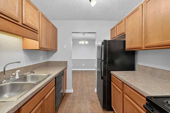 A room with a window and a door. at North Bluff Apartments, North Charleston