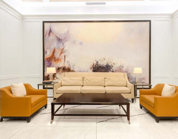 a living room with a couch and a table