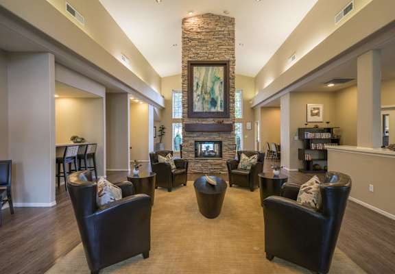 A Living Room With Leather Chairs at The Summit at Flagstaff, Flagstaff