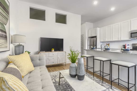 a living room with a couch and a tv