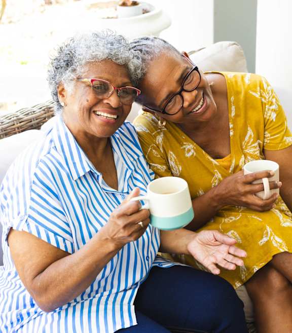 Adults Having A Coffee at Cambridge Square Apartments, Overland Park, Kansas