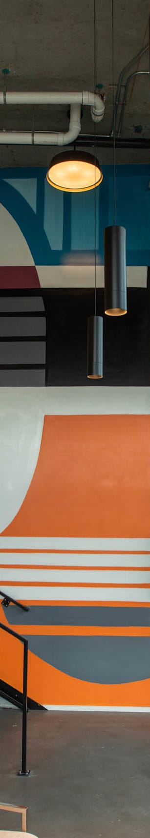 a mural in the lobby of a building at Analog Tacoma, Washington