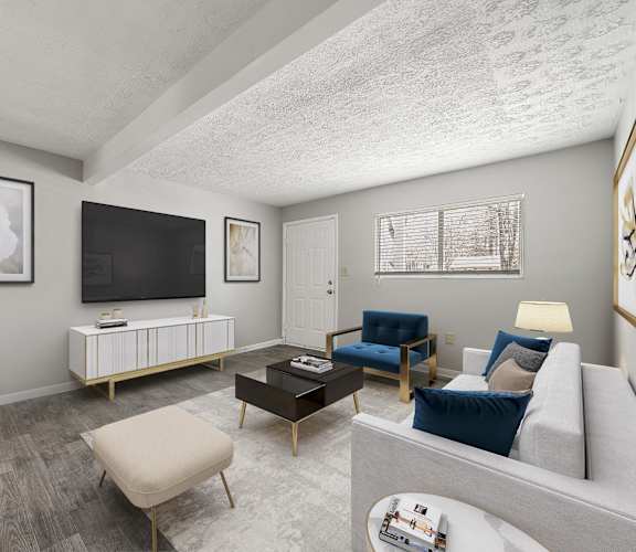 a living room with a couch and a tv