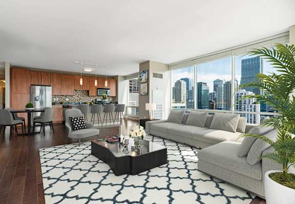 Potted plant and table in living room at Flair Tower Apartments, Chicago, IL 60654