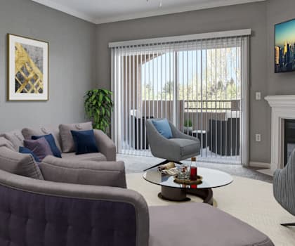A living room with a grey couch, a grey armchair, a coffee table, a fireplace, and a large painting on the wall.