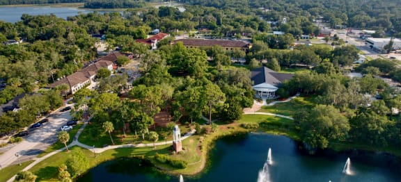 arial view of the resort and lake with sailboats in the water