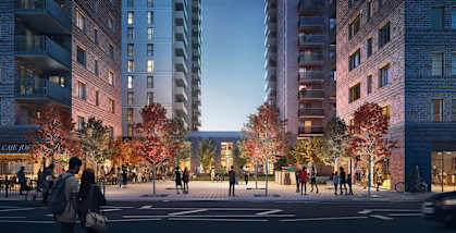 A street view of a city with people walking and cars driving.