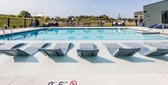 A pool with a height restriction sign of 6 feet.