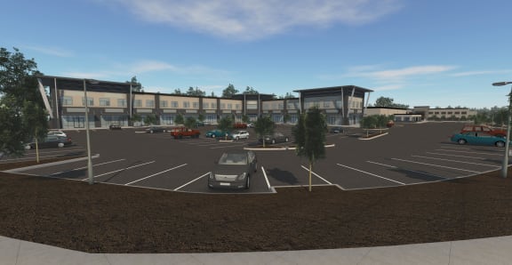 a parking lot with cars in front of a building