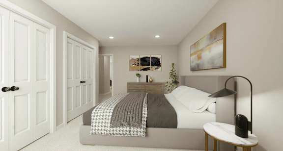 a master bedroom with a bed and a closet