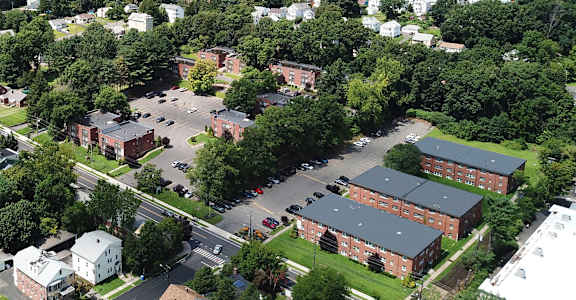 an aerial view of a parking lot in a city at Springwood Gardens, New Britain, CT, 06053