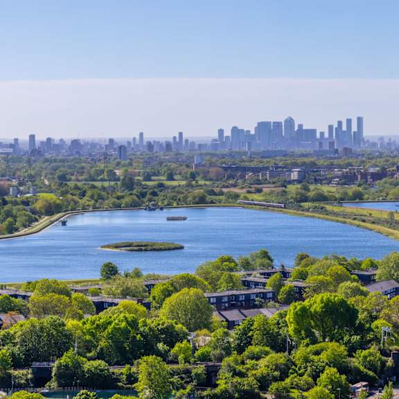 Aerial view of Walthamstow Wetlands reservoirs and green space near Ferry Island.