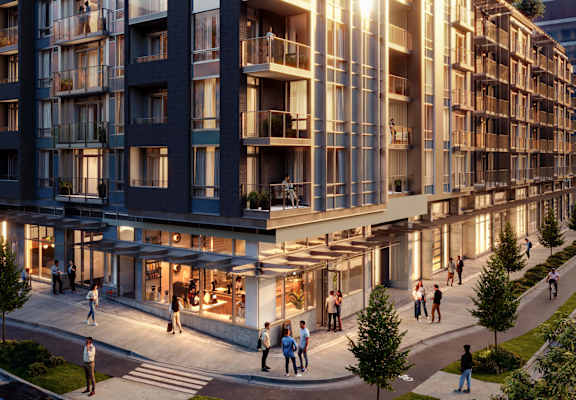 A modern apartment complex with people walking around the courtyard.