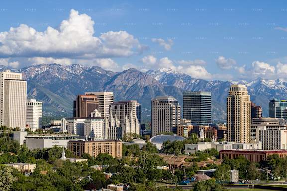 the skyline with the mountains in the background