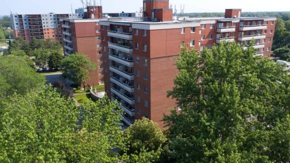 a view of a building from above with trees