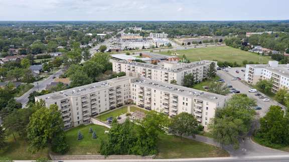 an aerial view of an apartment complex in a city