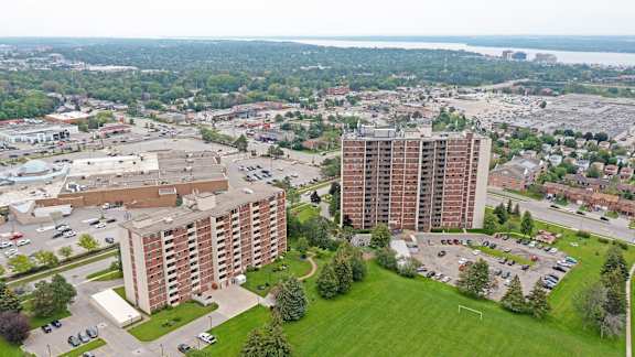 an aerial view of a city with tall buildings