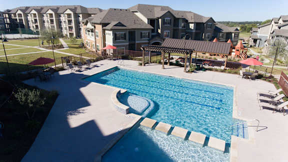 Pool at Ten 06 at Joshua Station Apartments, Joshua, TX 76058