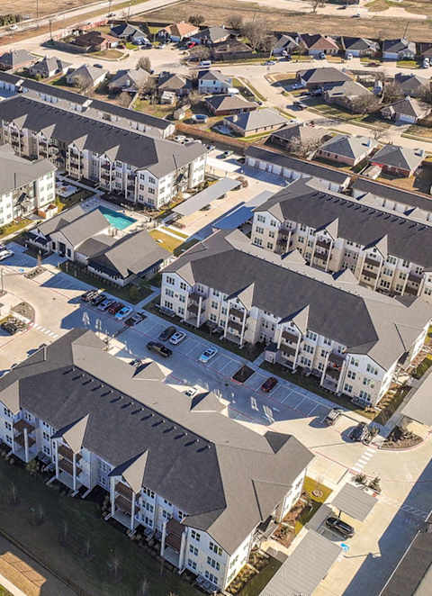 a rendering of an apartment building on a city street at Matlock Flats, Texas, 76001