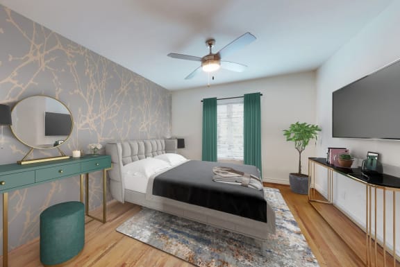 a bedroom with a bed and a desk with a mirror  at Sunset Barrington Gardens, Los Angeles, California