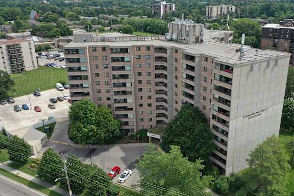 an aerial view of a large building in a city