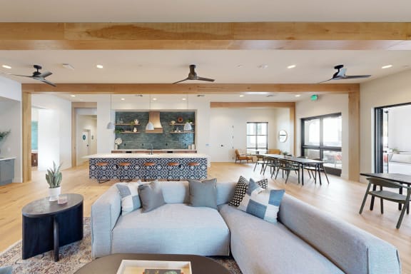 a living room with a couch and a table and a fireplace at Anacapa Canyon, Camarillo, 93012
