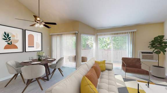 a living room with a white couch and a dining room table at Valley Plaza Villages, Pleasanton, 94566