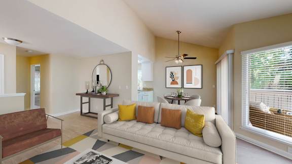 a living room with a couch in front of a window at Valley Plaza Villages, Pleasanton, 94566