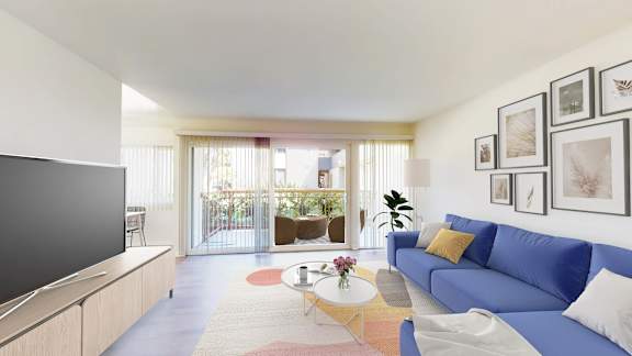 a living room with a blue couch and a tv at West Park Village, Los Angeles, California